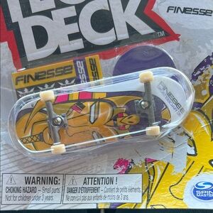 Finesse Fingerboard with Yellow and Purple Graphics